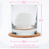 Lures Rocks Glass on a wooden table, ideal for housewarming gifts and designed in Denver, CO.