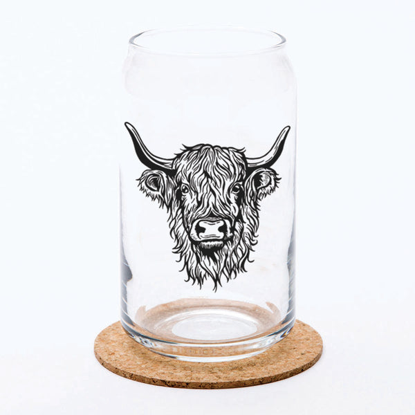 a glass with a cow's head drawn on it