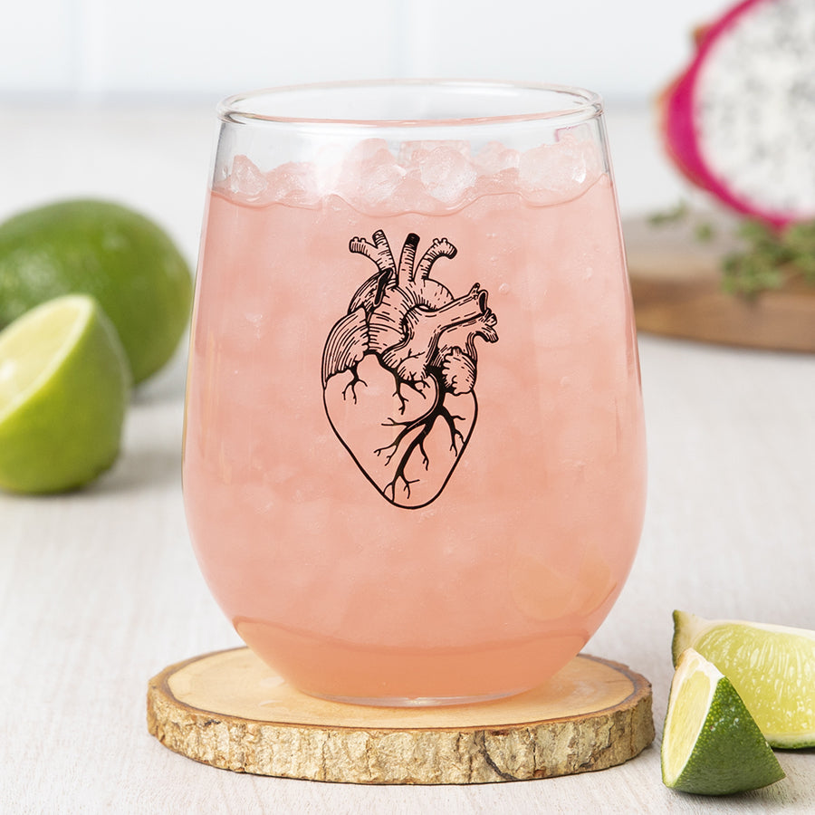 Black Anatomical Heart Stemless Wine Glass featuring a unique design with black print, perfect for wine enthusiasts and events.