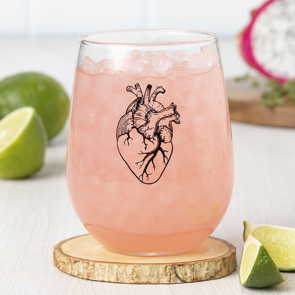 Black Anatomical Heart Stemless Wine Glass featuring a unique design with black print, perfect for wine enthusiasts and events.