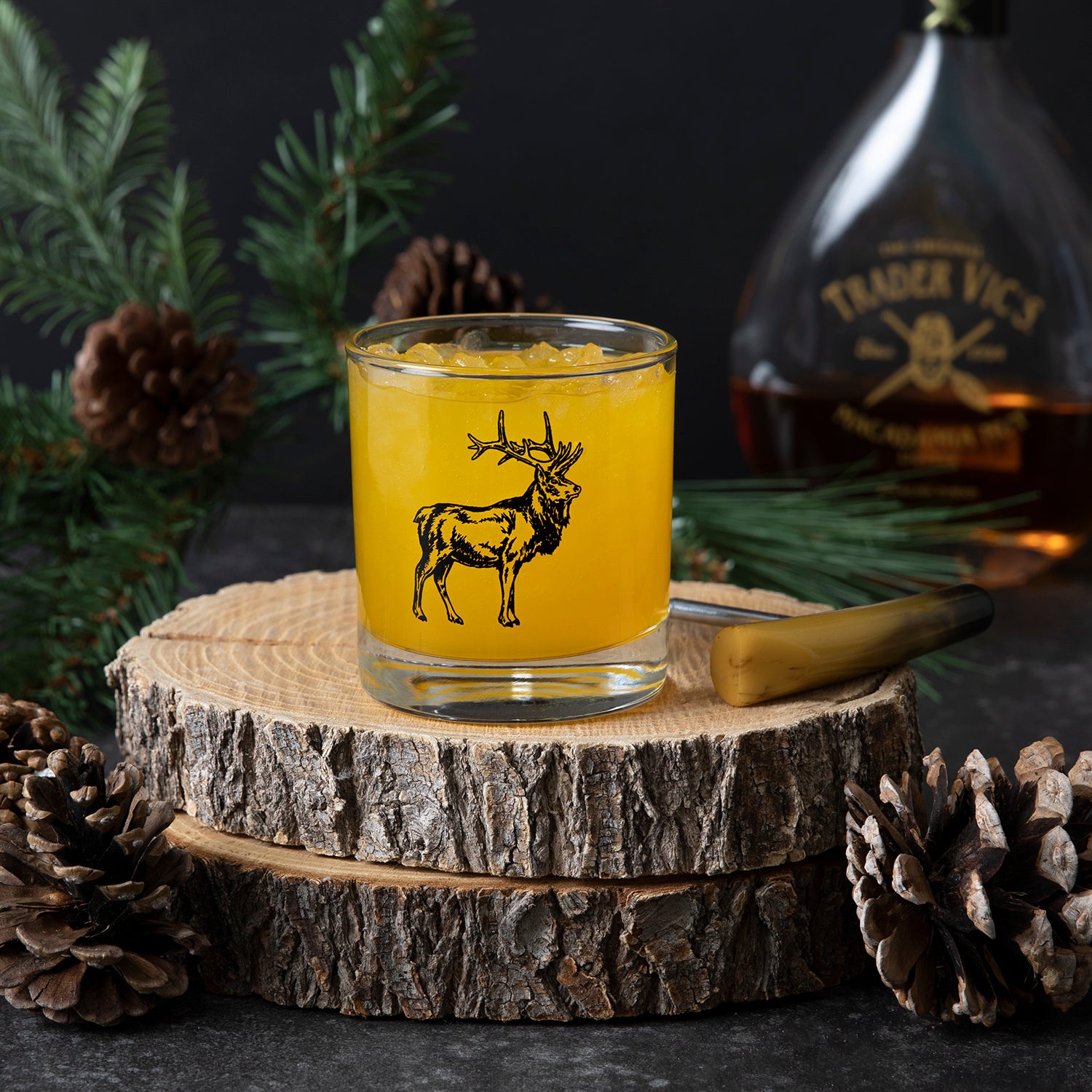 Elegant Elk Rocks Glass filled with whiskey, emphasizing its 11oz capacity ideal for old-fashioneds and bourbons.