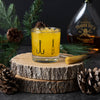 Lures Rocks Glass featuring a detailed fishing lure illustration, perfect for enjoying cocktails like scotch or bourbon.
