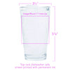 a glass filled with water and labeled with measurements