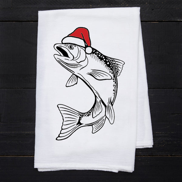 Santa Trout kitchen towel by Counter Couture featuring a hand-drawn trout illustration wearing a Santa hat on a white flour sack towel.