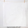 A plain white flour sack towel, measuring approximately 28" x 29", hanging on a clothesline against a light background, showcasing its smooth texture and size. Perfect for kitchen use.