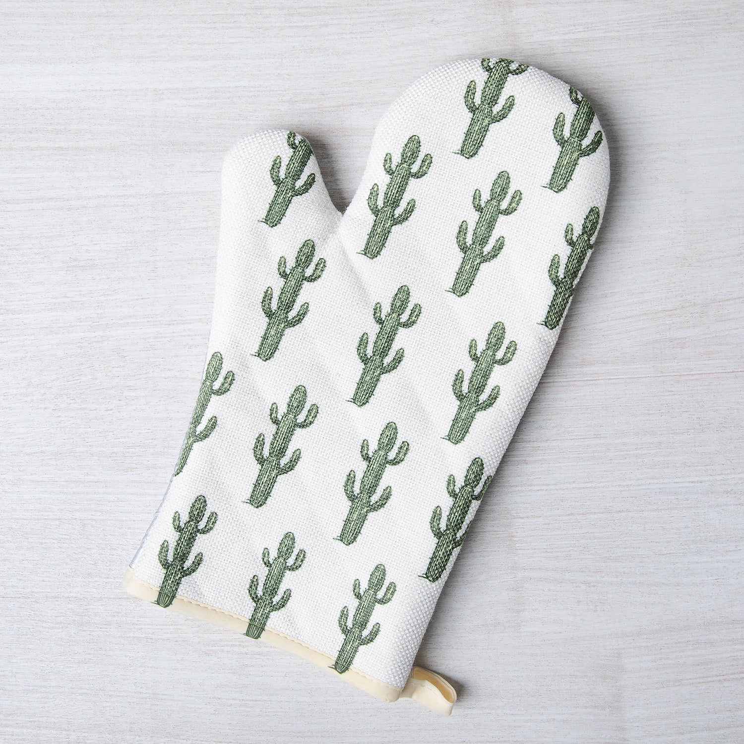 Saguaro Oven Mitt by Counter Couture featuring a unique design, ideal for housewarming gifts, with a fabric loop for hanging.