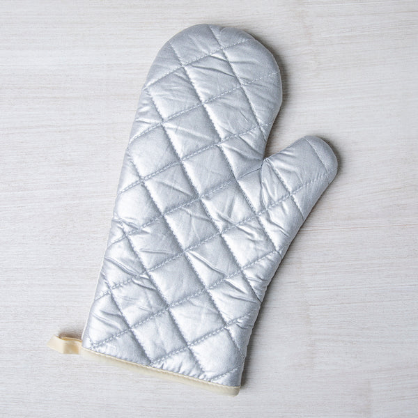 Saguaro Oven Mitt in action, highlighting its vibrant sublimated print and durable material, perfect for kitchen use.