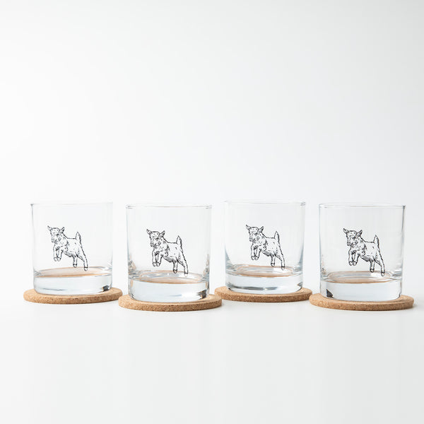 Elevate your drinkware collection with the Baby Goat Rocks Glass by Counter Couture, a lead-free glass designed for fun and functional use.