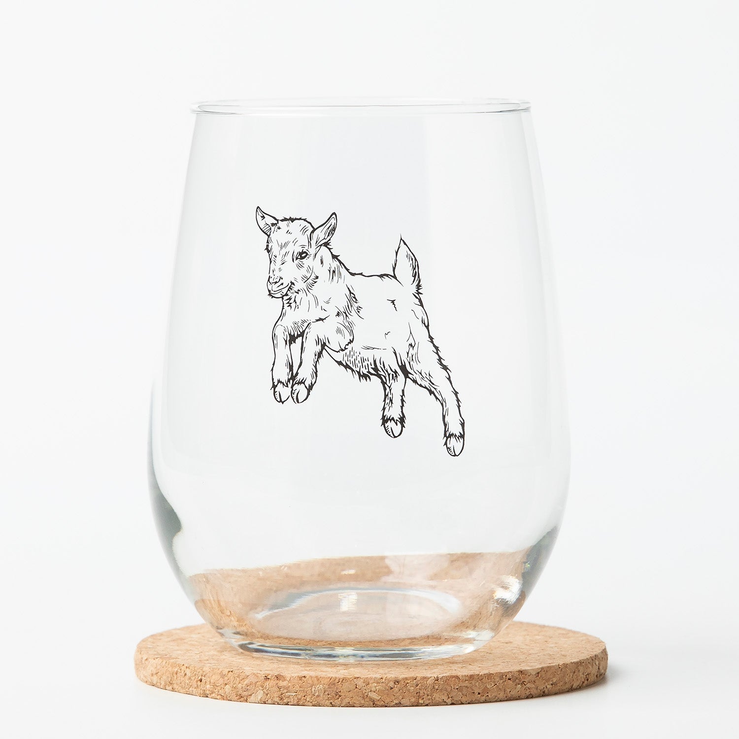 Close-up of the Baby Goat Stemless Wine Glass showcasing its unique print, ideal for entertaining.