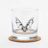 Hand-drawn bat illustration screen-printed on a rocks glass with a white background.