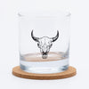 whiskey glass with screen printed buffalo skull on a white background.