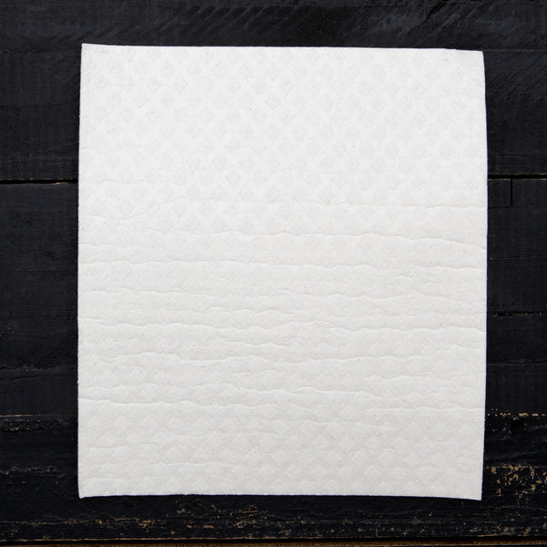 Mushroom Swedish Dish Cloth folded neatly, showcasing its unique mushroom designs, a must-have for eco-conscious consumers.