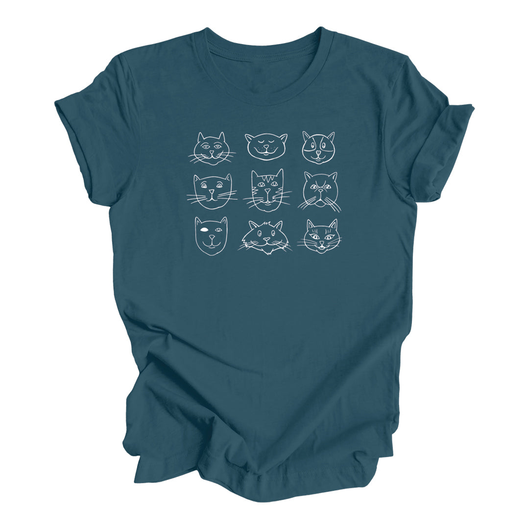 Silly Cat Faces Unisex Graphic T-shirt in dark ocean blue, showcasing playful cat faces design, perfect for casual and active wear.