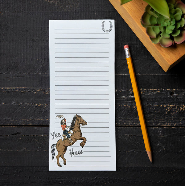 Magnetic strip on the Cowgirl Magnetic Notepad by Counter Couture, designed to stick to your fridge for ultimate convenience.