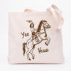 Cowgirl Canvas Tote bag by Counter Couture featuring a playful illustration of a cowgirl on horseback with the words 'Yee Haw' printed in brown ink. Perfect for shopping or carrying everyday essentials.