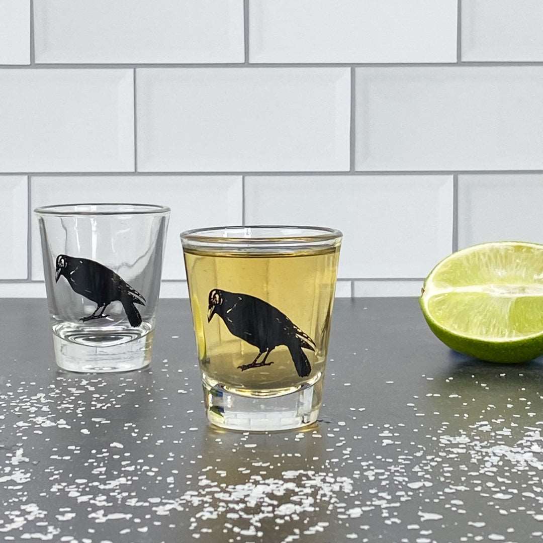 Crow skull shot glass set with lime and salt on kitchen counter