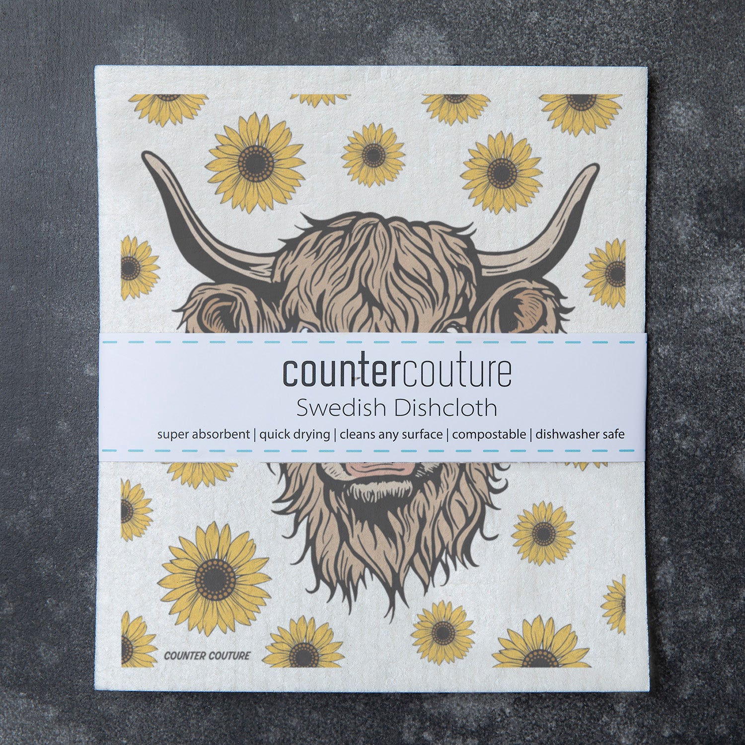 Bright and cheerful Highland Cow Swedish Dishcloth by Counter Couture, designed to make cleaning enjoyable and sustainable.
