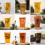 Mix and match pint glasses with unique designs: jackalope, lake life, lures, moose, mountains, sasquatch, raccoon, skull, and trout.