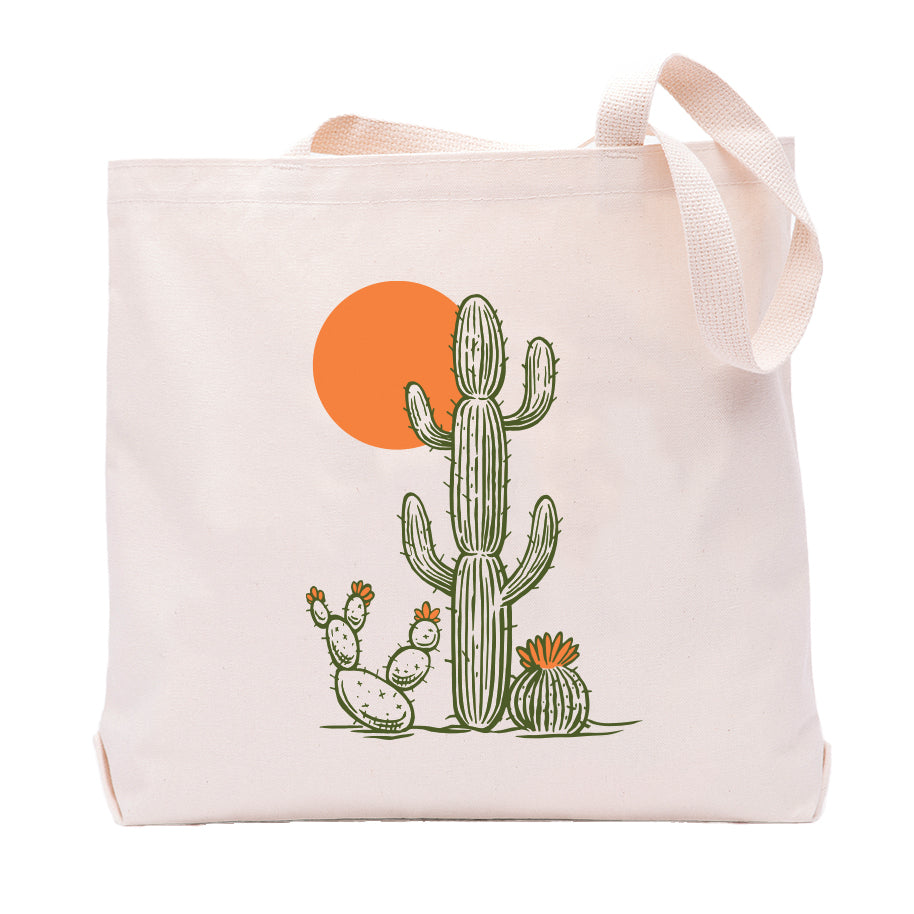 Saguaro tote bag featuring a fun cactus design with a bright orange sun, perfect for eco-friendly shopping and carrying groceries, made by Counter Couture.