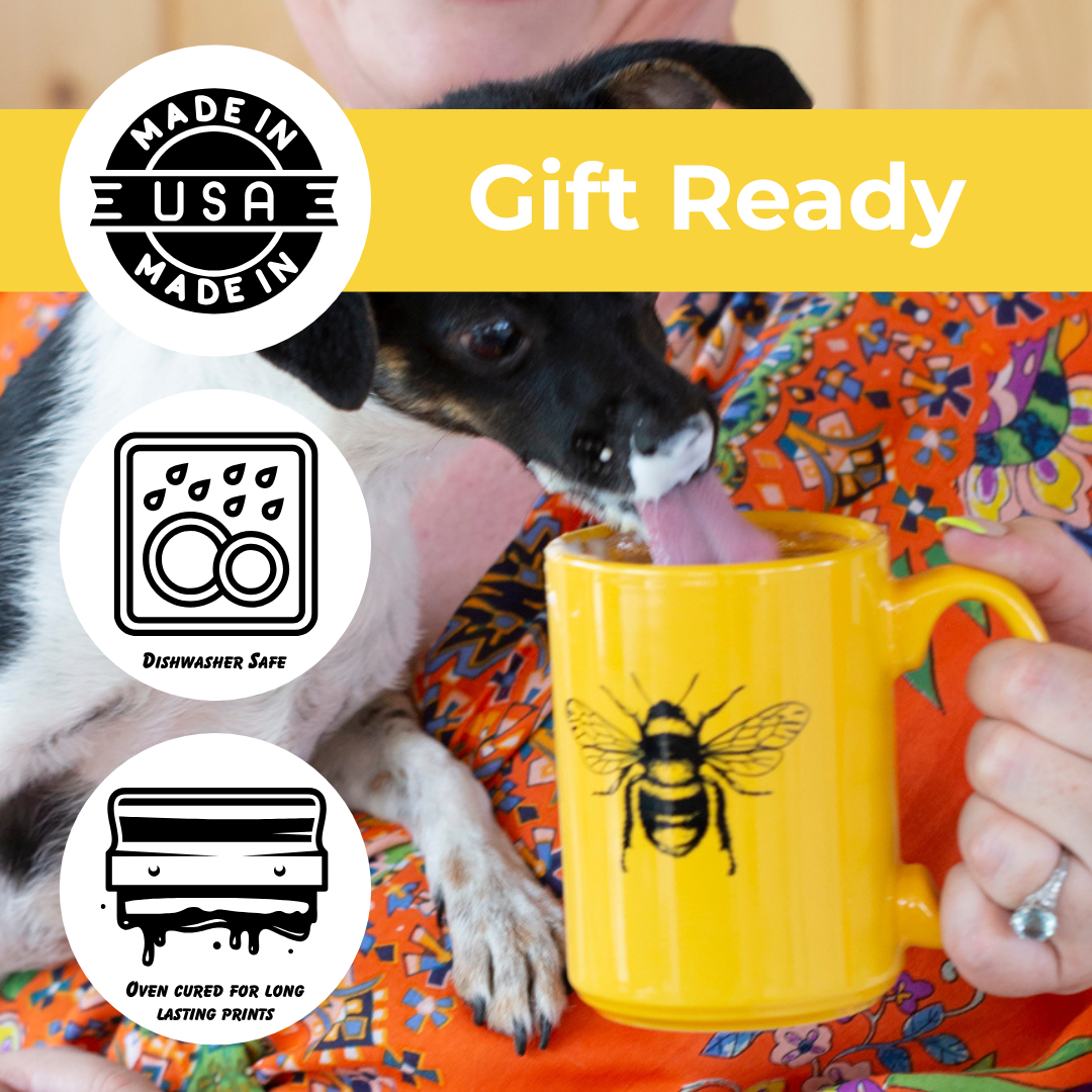 Dog licking yellow bee mug held by person in floral shirt, dishwasher safe icons visible