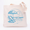 a tote bag with a drawing of a beach chair and umbrella