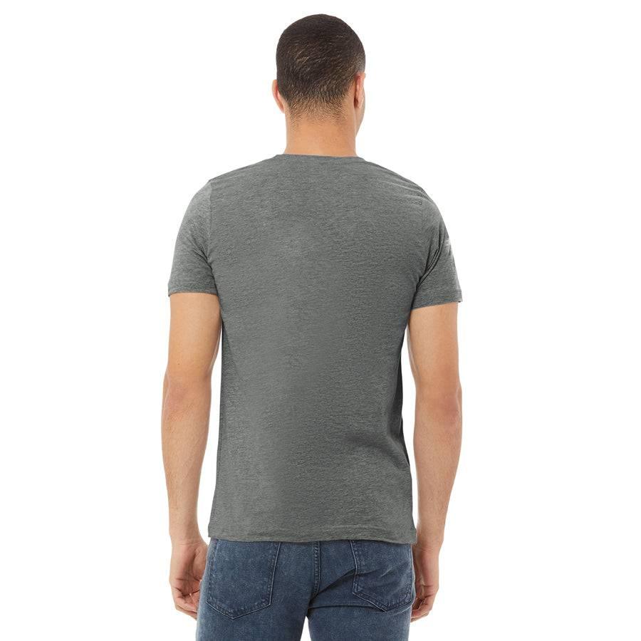 Back view of a man wearing a deep heather gray short sleeve graphic t-shirt and blue jeans